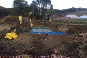 Mechanical Stripping of Grave Sites