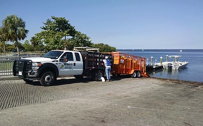 Training exercise using a work boat to deploy boom containment boom