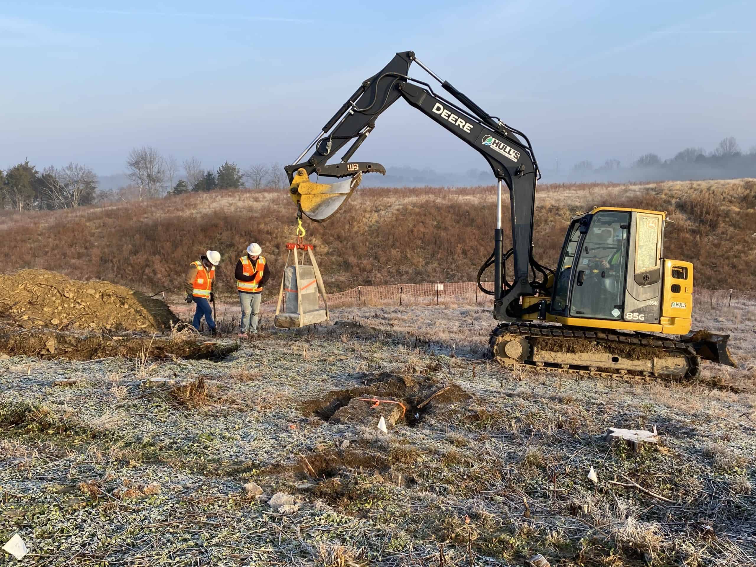 Mechanical Stripping of Grave Sites